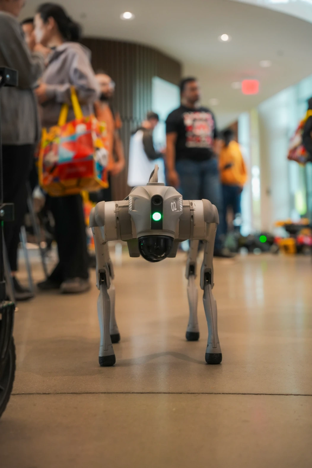A four-legged robot at a student technology demonstration.